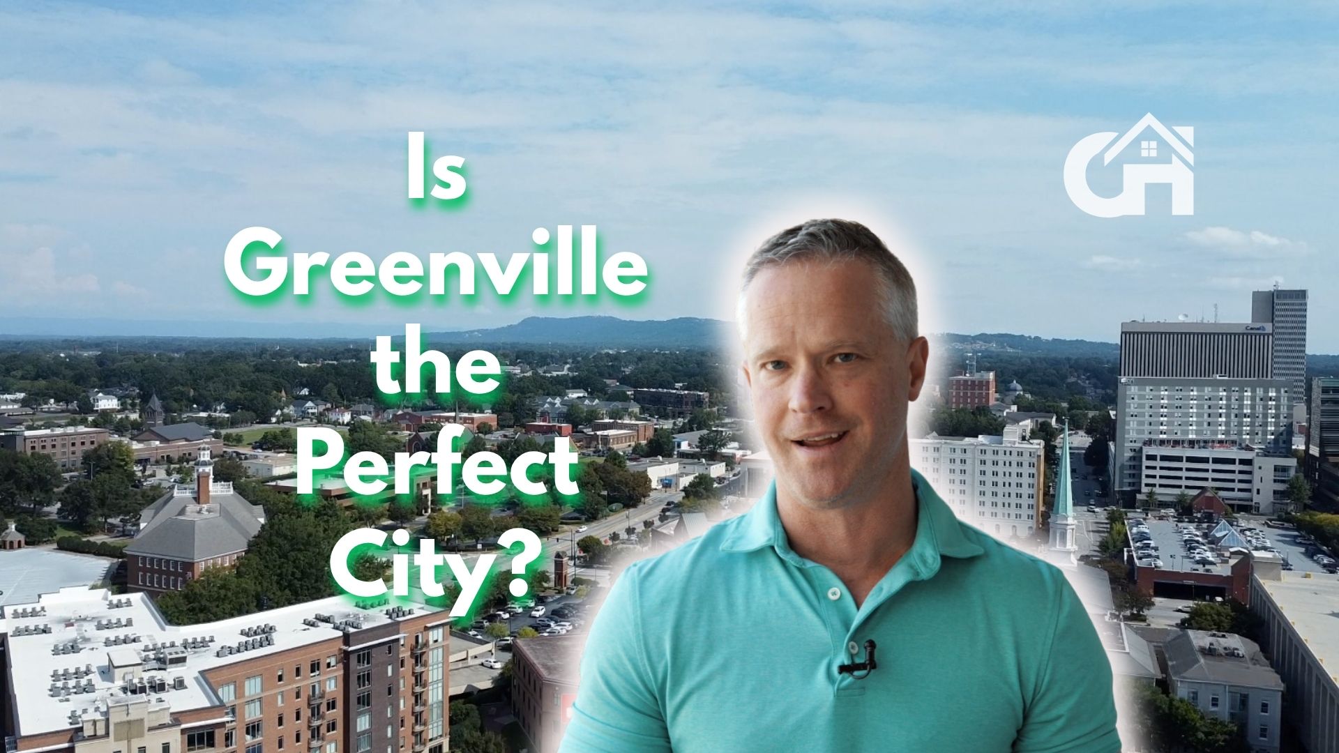 Aerial view of downtown Greenville South Carolina featuring Falls Park, Liberty Bridge, and the Reedy River surrounded by vibrant fall colors.